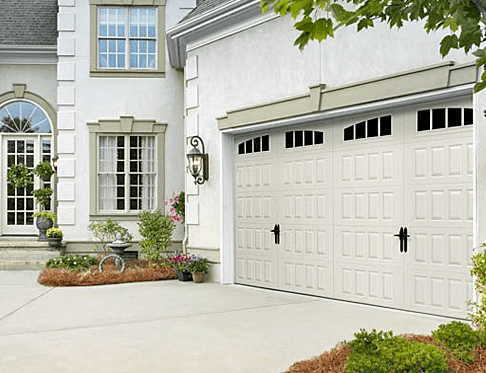 Raised Panel design with Arched Thames Windows garage door