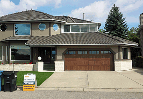 after image of a home garage door replaced with CHI Plank