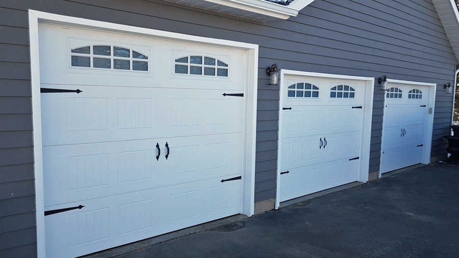 Cladding Around Garage Door in Calgary installed by Glenmore Doors