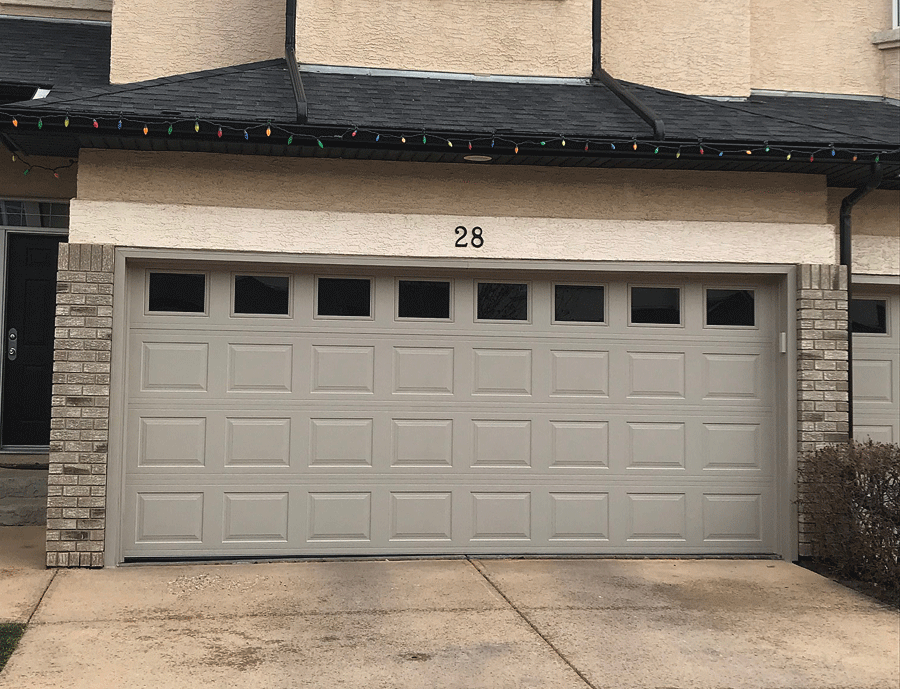 Cladding Around Garage Door in Calgary installed by Glenmore Doors